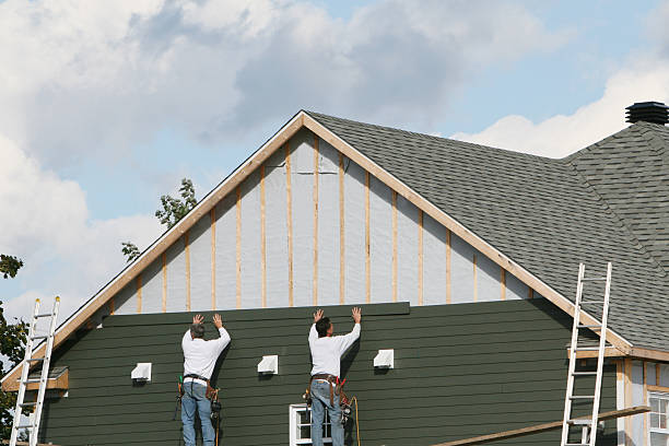Professional Siding Replacement technician working in Pleasant Hall, PA